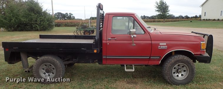 image for item DB7707 1990 Ford F250 flatbed pickup truck