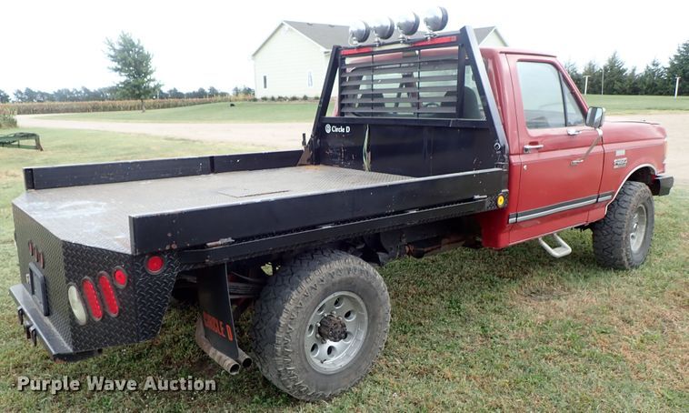 image for item DB7707 1990 Ford F250 flatbed pickup truck