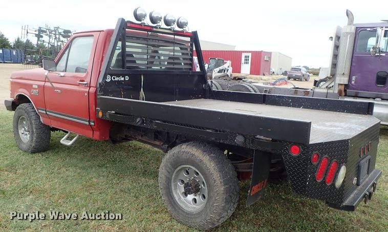 image for item DB7707 1990 Ford F250 flatbed pickup truck