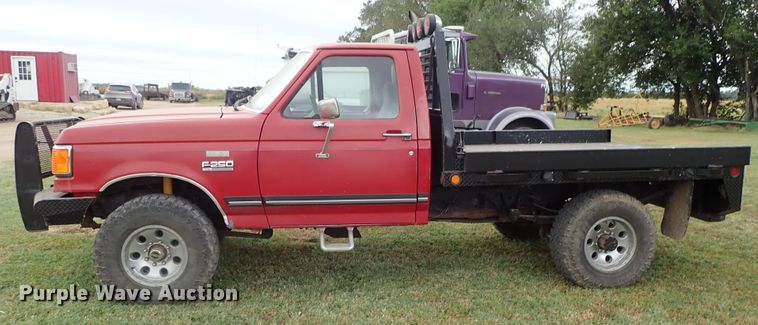 image for item DB7707 1990 Ford F250 flatbed pickup truck