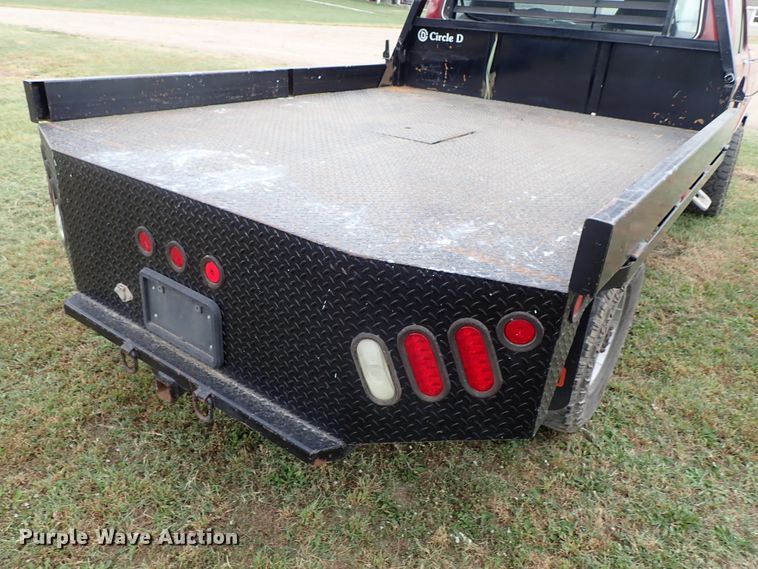 image for item DB7707 1990 Ford F250 flatbed pickup truck