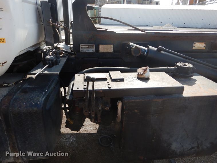 image for item DH2187 1999 Mack DM690S roll off container truck