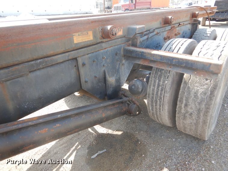 image for item DH2187 1999 Mack DM690S roll off container truck