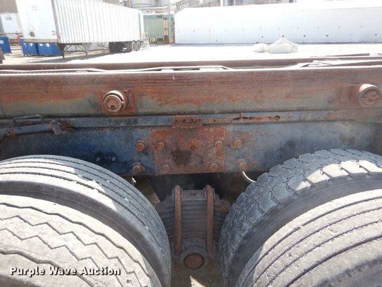 image for item DH2187 1999 Mack DM690S roll off container truck