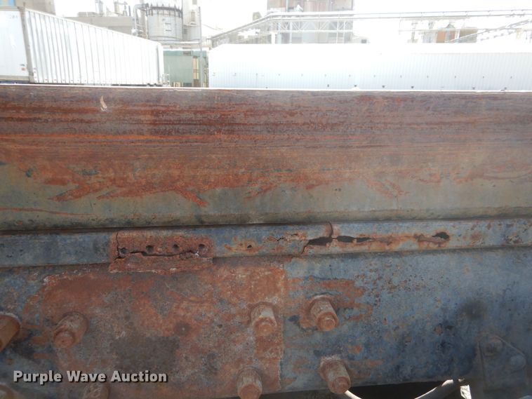 image for item DH2187 1999 Mack DM690S roll off container truck