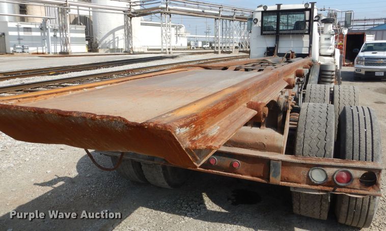 image for item DH2187 1999 Mack DM690S roll off container truck