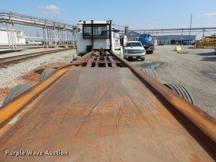 image for item DH2187 1999 Mack DM690S roll off container truck