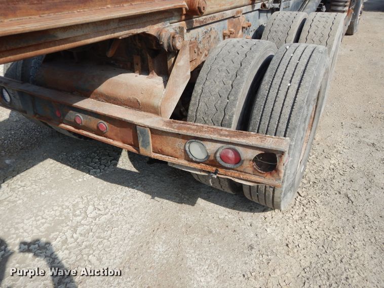 image for item DH2187 1999 Mack DM690S roll off container truck