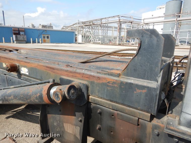 image for item DH2187 1999 Mack DM690S roll off container truck