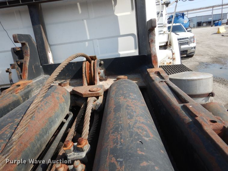 image for item DH2187 1999 Mack DM690S roll off container truck