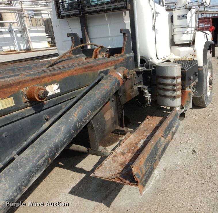 image for item DH2187 1999 Mack DM690S roll off container truck