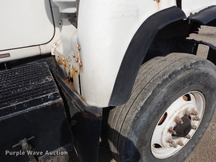 image for item DH2187 1999 Mack DM690S roll off container truck