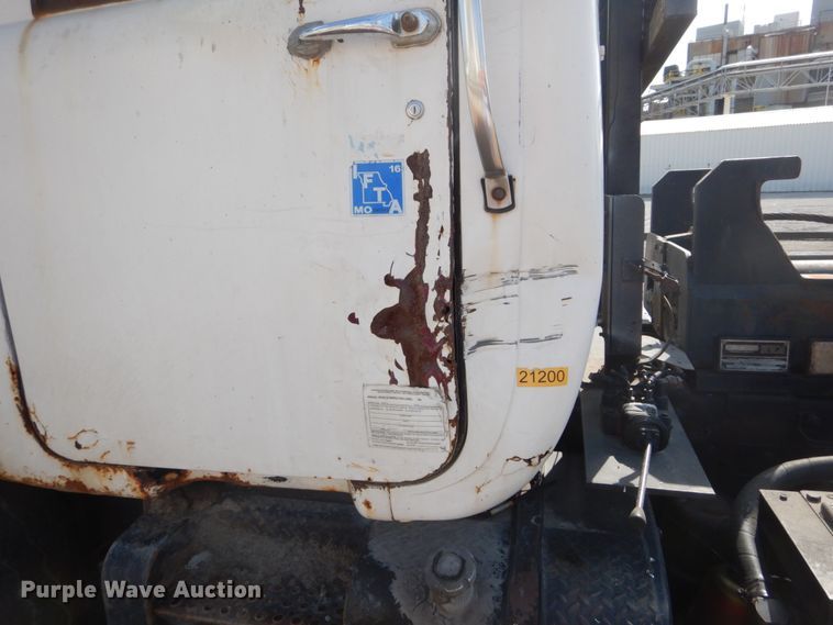 image for item DH2187 1999 Mack DM690S roll off container truck