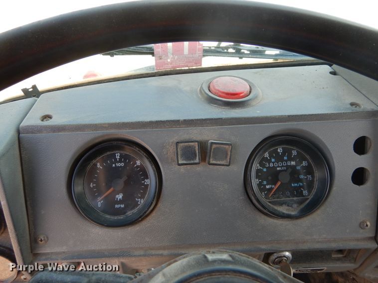 image for item DH2187 1999 Mack DM690S roll off container truck