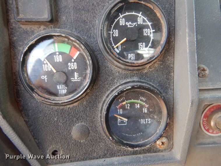 image for item DH2187 1999 Mack DM690S roll off container truck