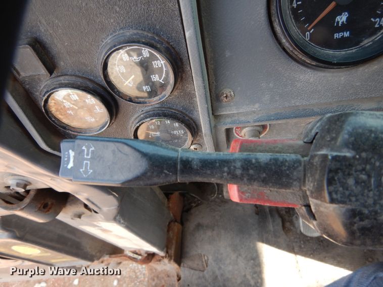 image for item DH2187 1999 Mack DM690S roll off container truck