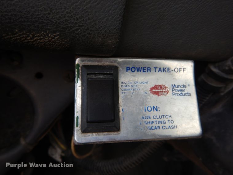 image for item DH2187 1999 Mack DM690S roll off container truck