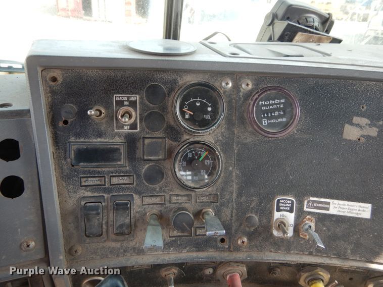 image for item DH2187 1999 Mack DM690S roll off container truck