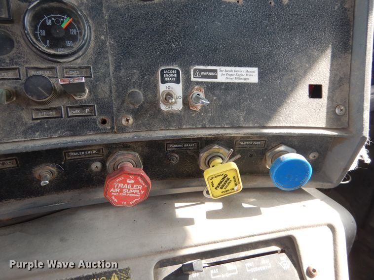 image for item DH2187 1999 Mack DM690S roll off container truck