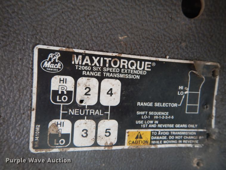 image for item DH2187 1999 Mack DM690S roll off container truck