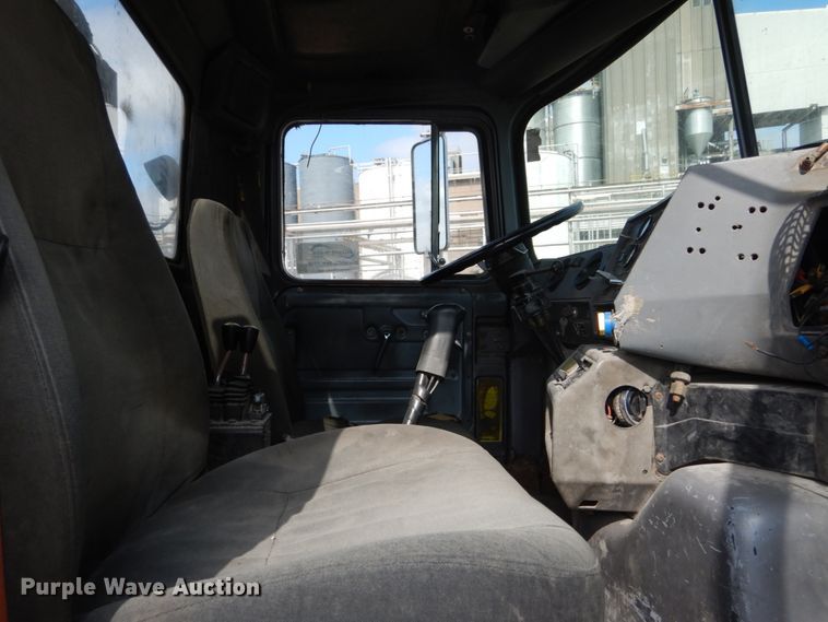 image for item DH2187 1999 Mack DM690S roll off container truck