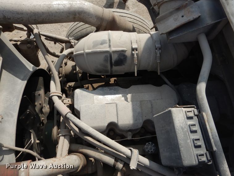 image for item DH2187 1999 Mack DM690S roll off container truck