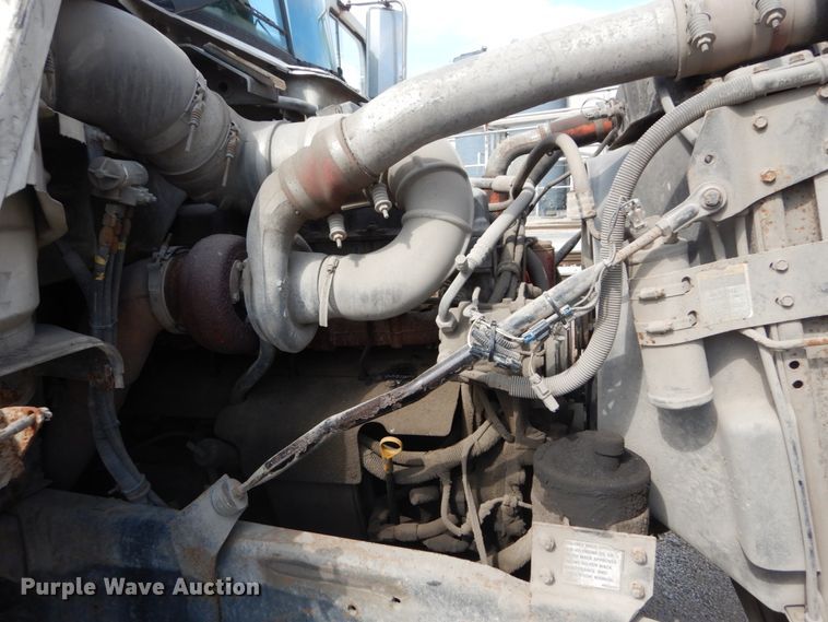 image for item DH2187 1999 Mack DM690S roll off container truck