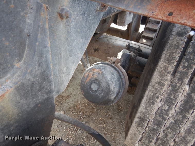 image for item DH2187 1999 Mack DM690S roll off container truck