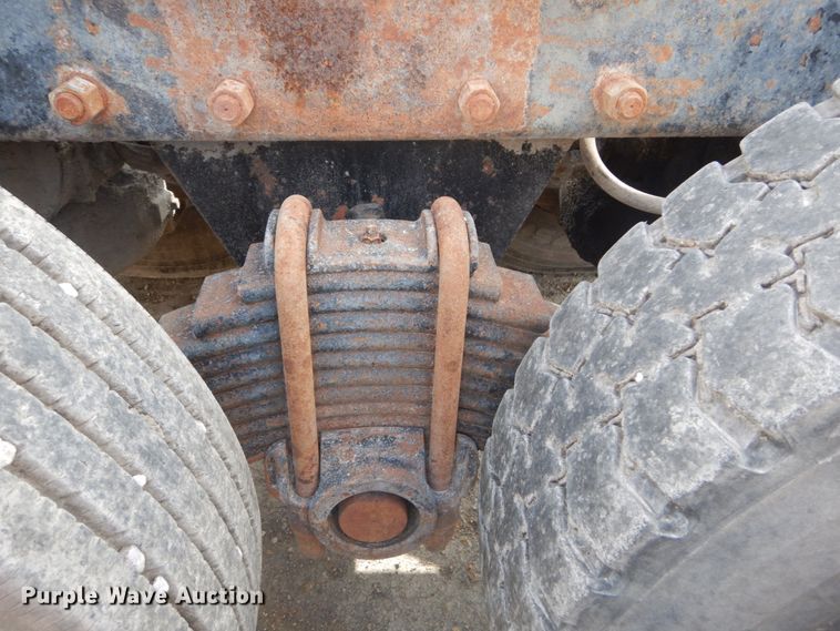 image for item DH2187 1999 Mack DM690S roll off container truck