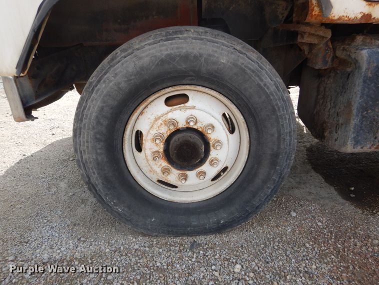 image for item DH2187 1999 Mack DM690S roll off container truck