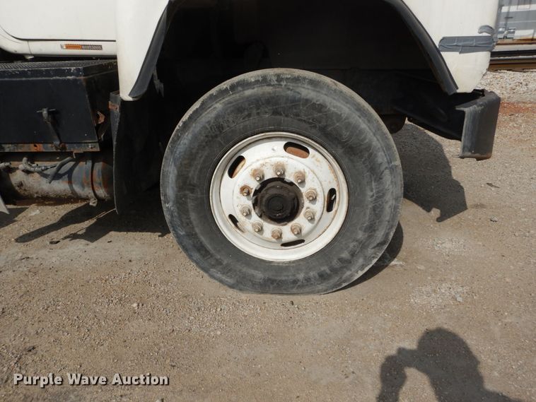 image for item DH2187 1999 Mack DM690S roll off container truck