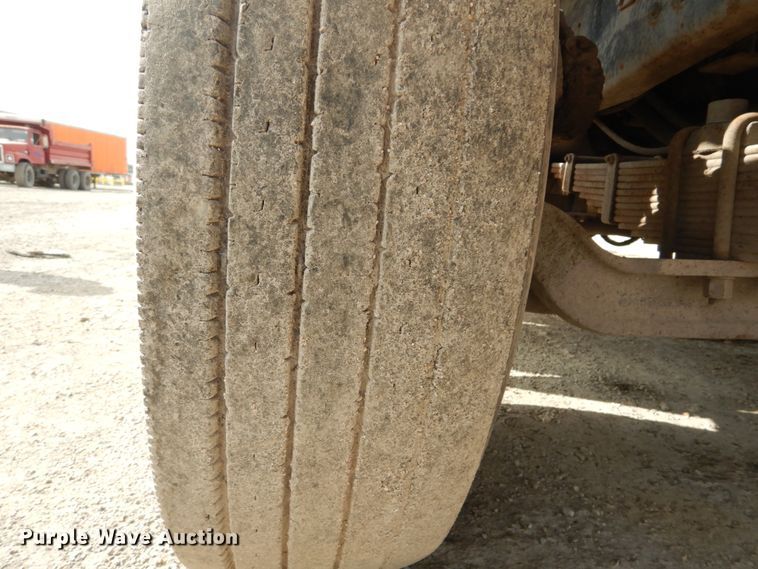 image for item DH2187 1999 Mack DM690S roll off container truck