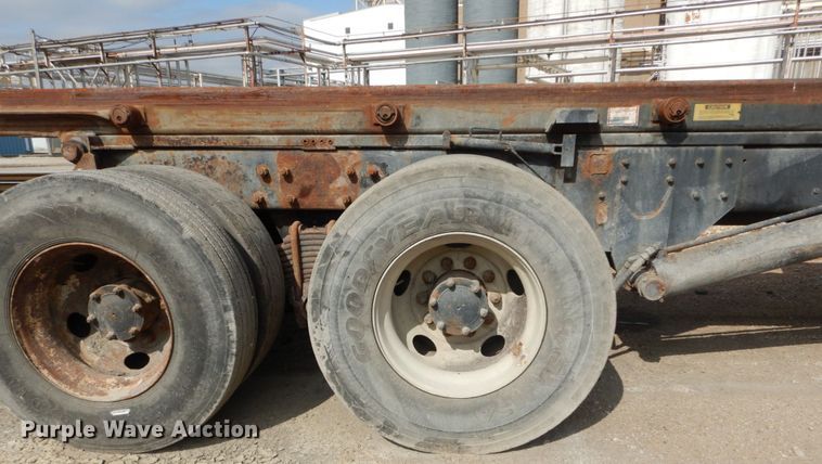 image for item DH2187 1999 Mack DM690S roll off container truck