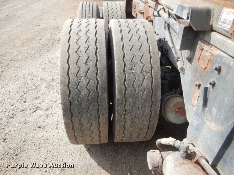 image for item DH2187 1999 Mack DM690S roll off container truck