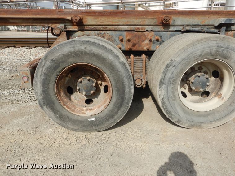 image for item DH2187 1999 Mack DM690S roll off container truck