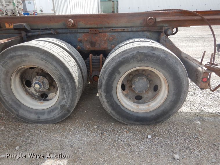 image for item DH2187 1999 Mack DM690S roll off container truck