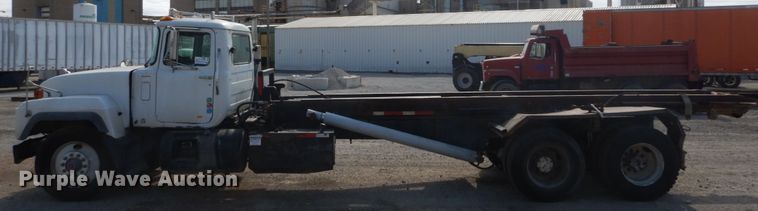 image for item DH2188 1999 Mack RD688S roll off container truck