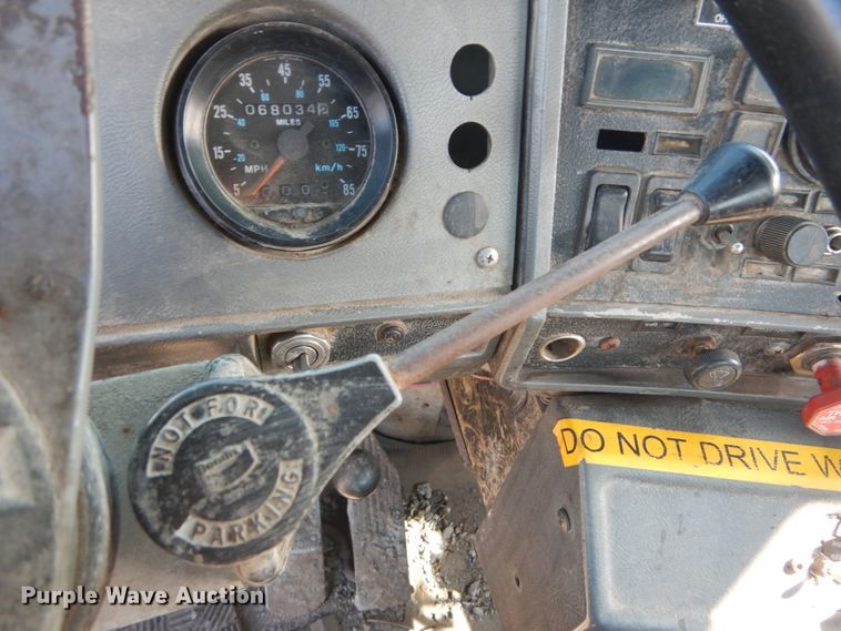 image for item DH2188 1999 Mack RD688S roll off container truck