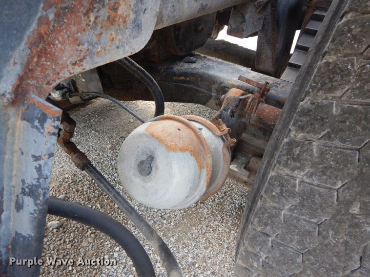 image for item DH2188 1999 Mack RD688S roll off container truck