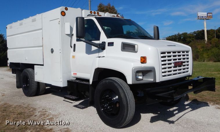 image for item DH2203 2004 GMC C6500 chipper truck