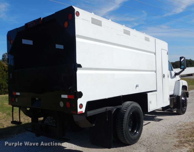 image for item DH2203 2004 GMC C6500 chipper truck