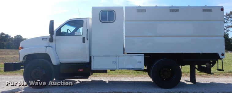 image for item DH2203 2004 GMC C6500 chipper truck