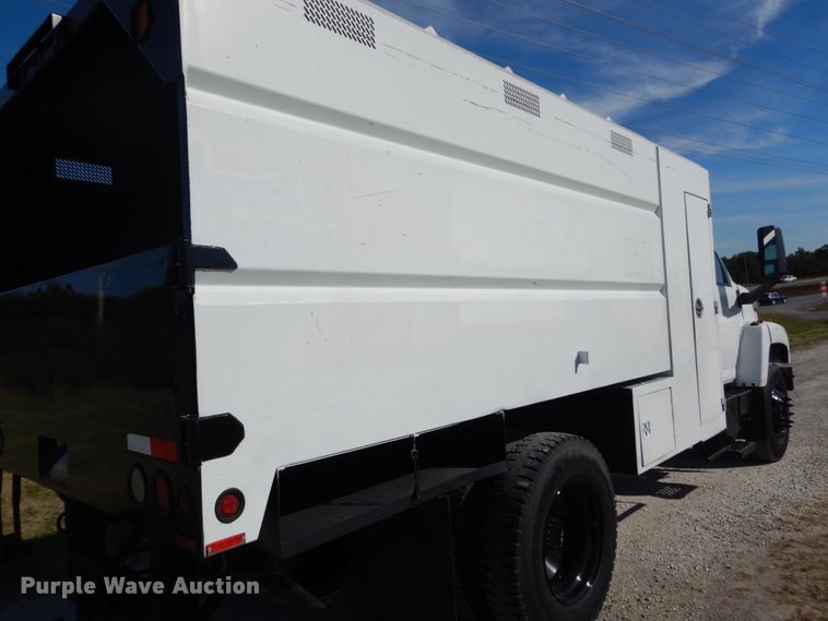 image for item DH2203 2004 GMC C6500 chipper truck