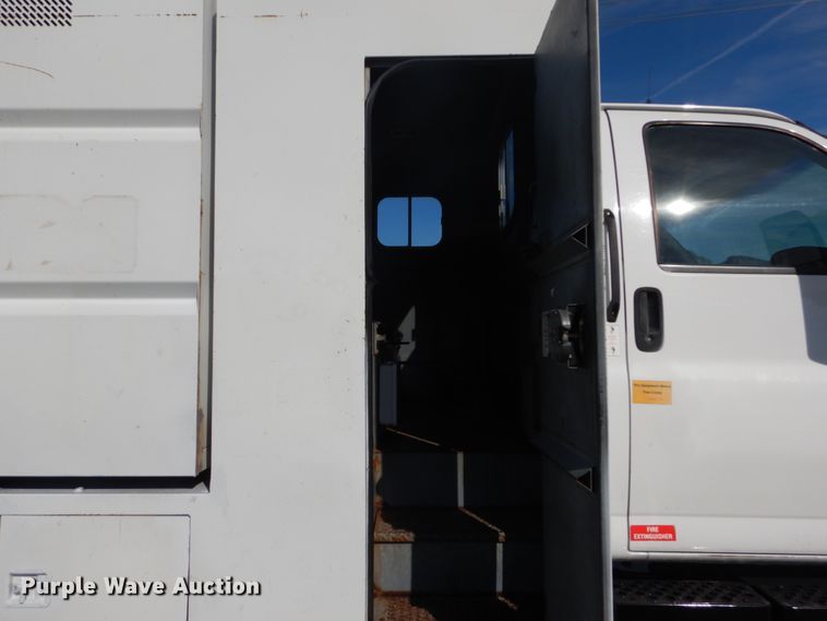 image for item DH2203 2004 GMC C6500 chipper truck
