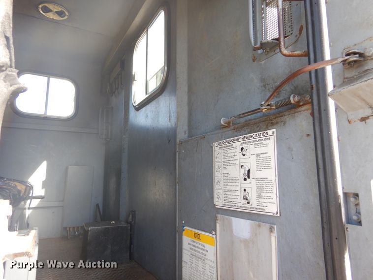 image for item DH2203 2004 GMC C6500 chipper truck