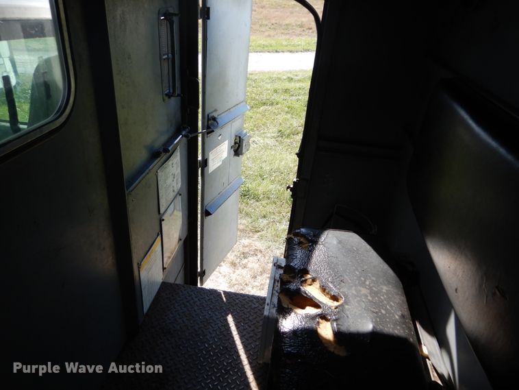 image for item DH2203 2004 GMC C6500 chipper truck