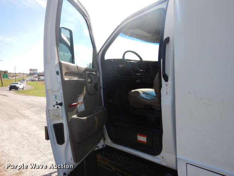 image for item DH2203 2004 GMC C6500 chipper truck