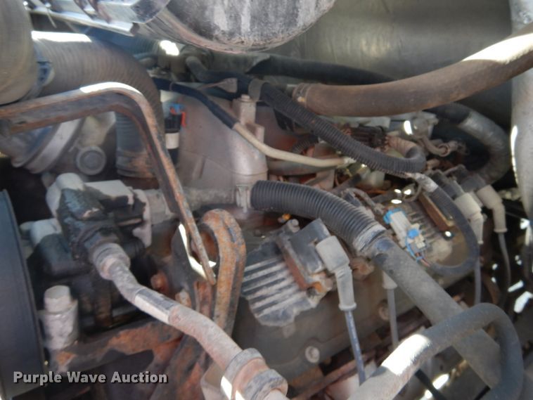 image for item DH2203 2004 GMC C6500 chipper truck