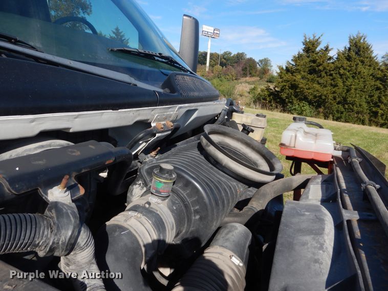 image for item DH2203 2004 GMC C6500 chipper truck