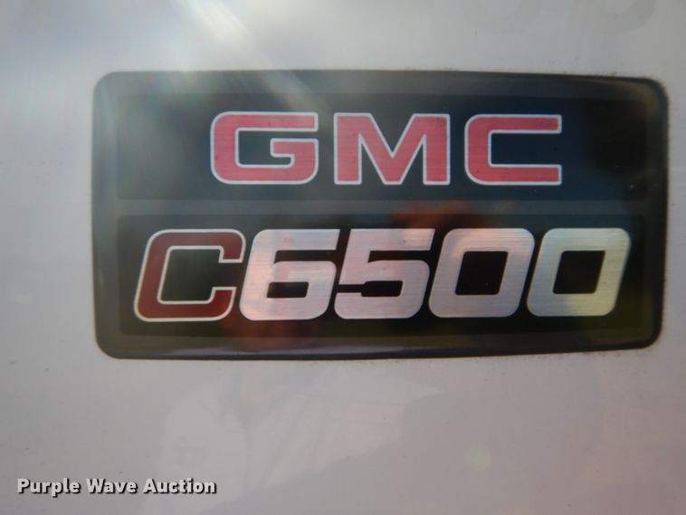 image for item DH2203 2004 GMC C6500 chipper truck